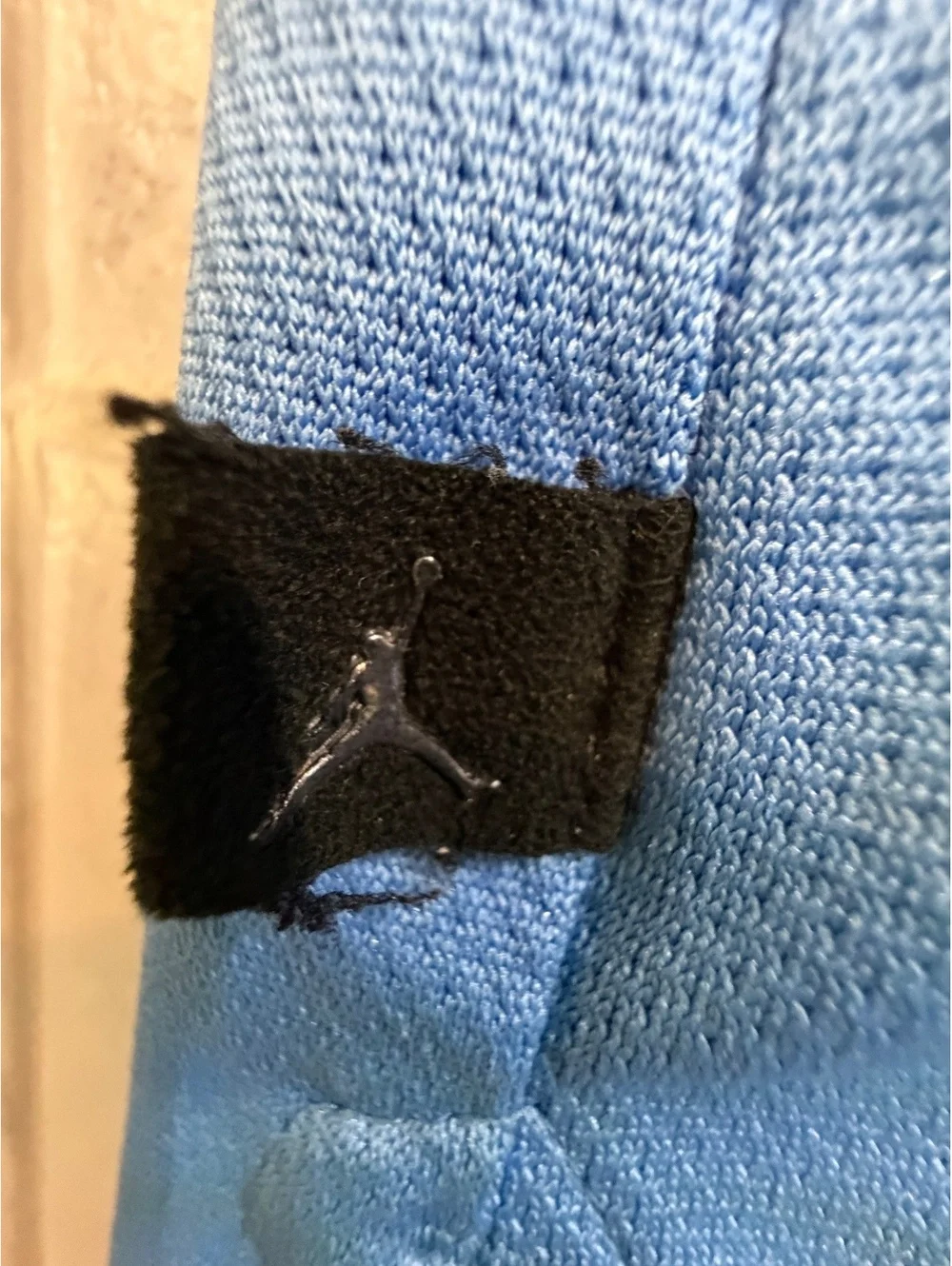 Jordan blue and white short sleeve polo shirt